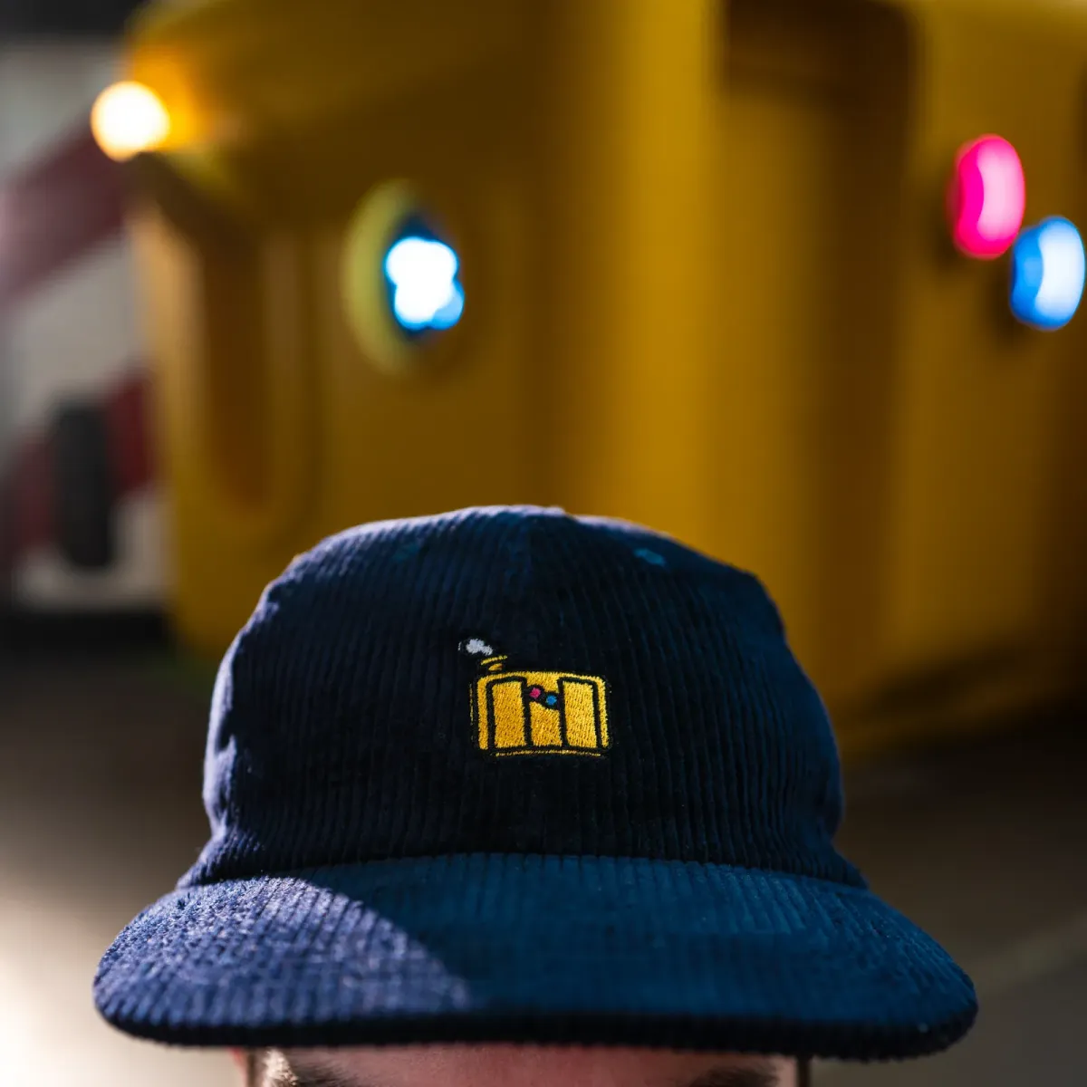 Yellow Loomarine Cap in navy corduroy, embroidered front